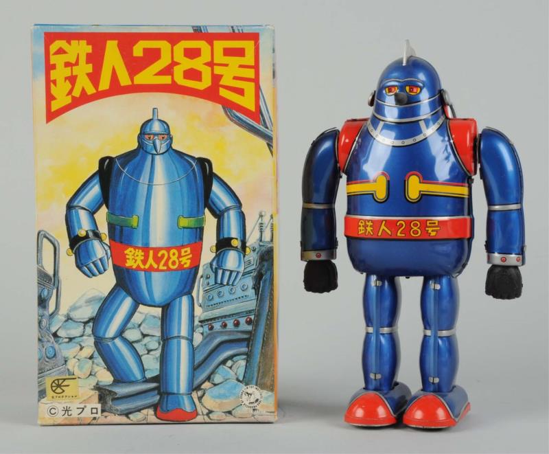 Appraisal: Contemporary Japanese Tetsujin Walking Figure Tin litho and wind -