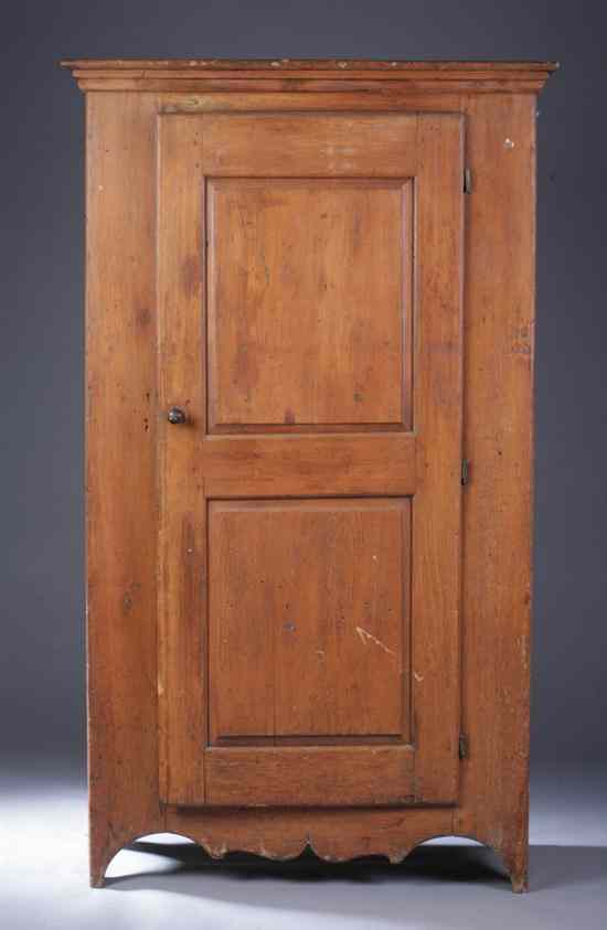 Appraisal: AMERICAN PINE ONE-DOOR COUNTRY CUPBOARD th century Molded cornice double-panel