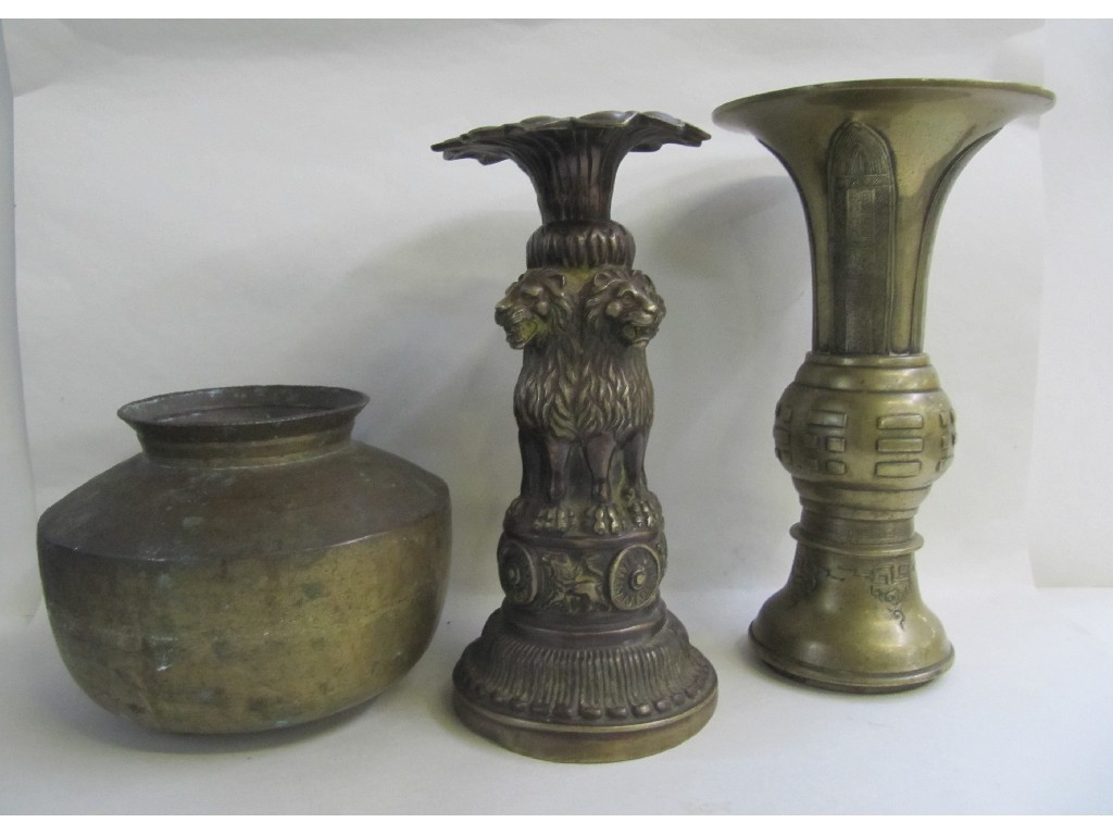 Appraisal: Chinese brass gu shaped vase spittoon and another brass vase