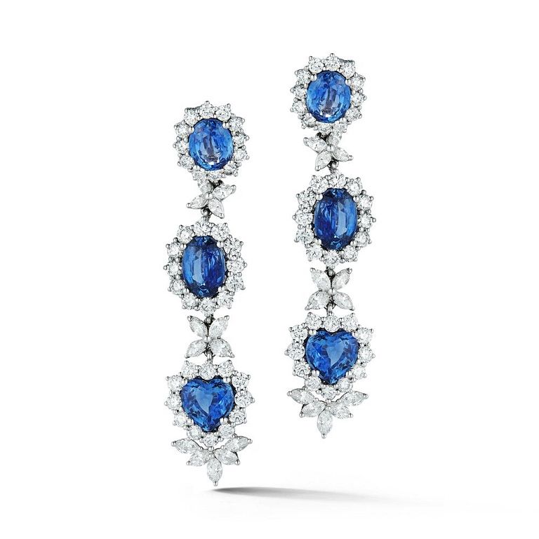 Appraisal: SAPPHIRE AND DIAMOND EARRING SAPPHIRE AND DIAMOND EARRING Vibrant sapphires