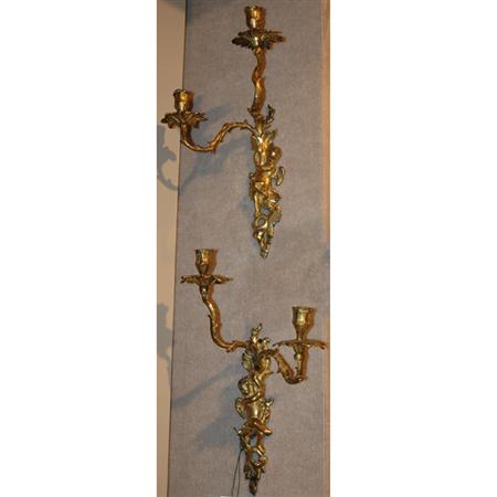 Appraisal: Pair of Early Louis XV Style Gilt-Bronze Two-Light Sconces Estimate