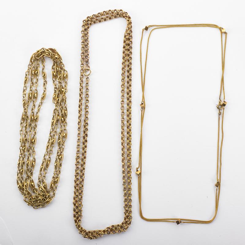 Appraisal: THREE VICTORIAN YELLOW GOLD NECK CHAINS Fancy k oval link