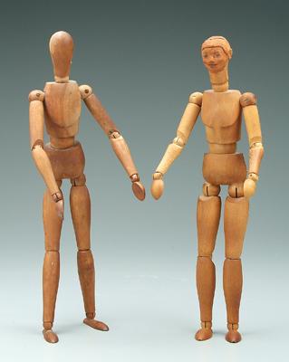 Appraisal: Two wooden artist models jointed hands elbows shoulders hips knees