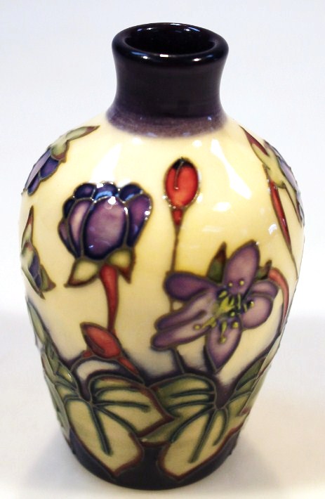 Appraisal: A Moorcroft Hepatica pattern vase by Emma Bossons of shouldered