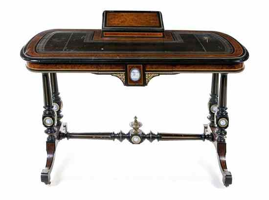 Appraisal: An English Victorian Burlwood and Ebonized Writing Desk the tooled