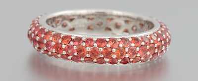 Appraisal: An Orange Sapphire Eternity Band k white gold eternity band