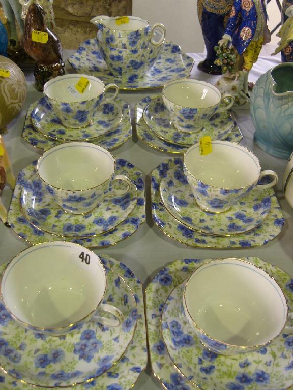 Appraisal: A -place Shelley chintz type tea service with blue pansy