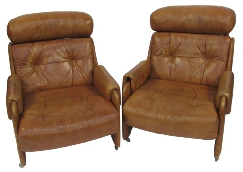 Appraisal: Two s s brown leather reclining armchairs