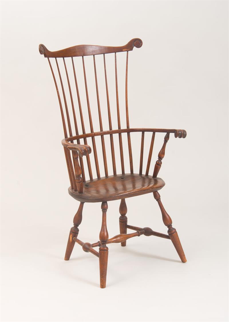 Appraisal: AMERICAN OAK COMB-BACK WINDSOR ARMCHAIR x x in Estimate -