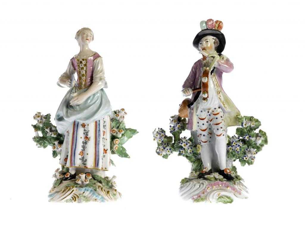 Appraisal: TWO DERBY FIGURES OF MUSICIANS one of a boy playing