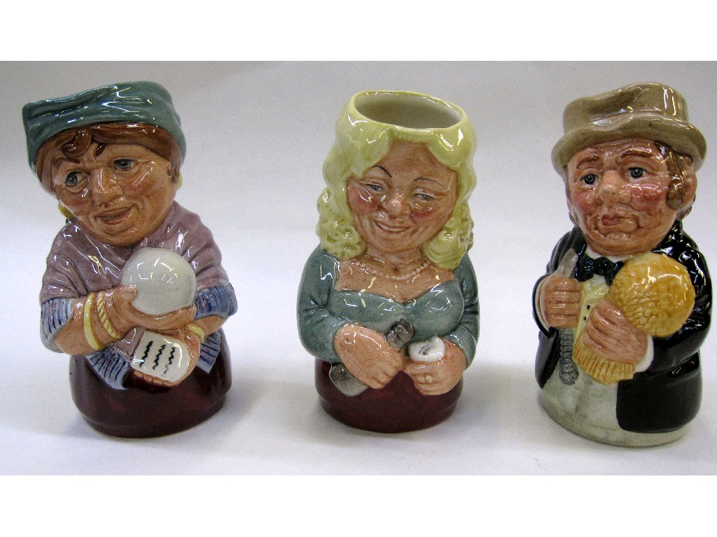 Appraisal: Three Royal Doulton characters from the Doultonville Collection to include