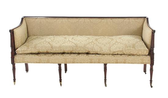 Appraisal: Sheraton mahogany sofa circa reeded toprail leading to fluted column