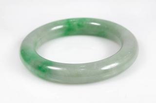 Appraisal: Jadeite bangle bracelet Jadeite bangle bracelet featuring a full jadeite