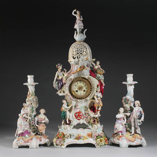 Appraisal: A German porcelain assembled clock garniture early th century The