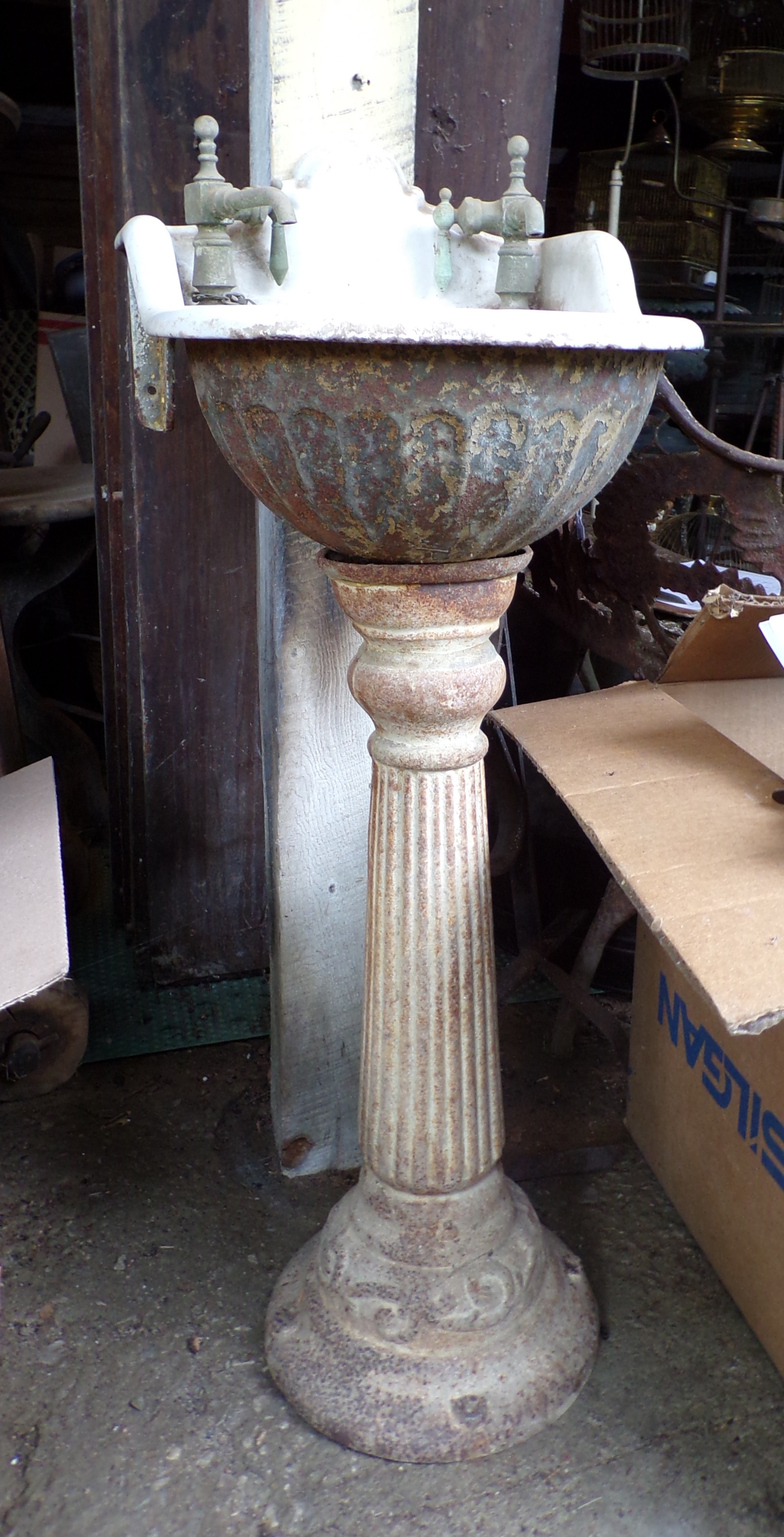 Appraisal: Victorian cast iron and porcelain diminutive sink on pedestal ''h