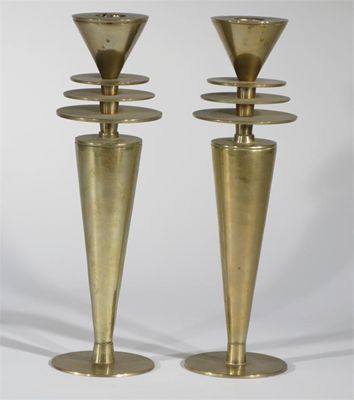 Appraisal: A pair of Maison Desny style modernist candlesticks flaring cylindrical