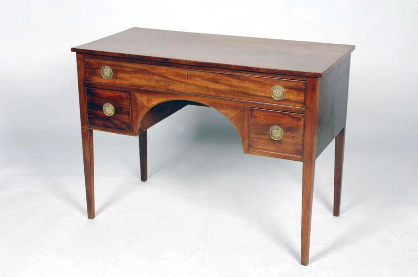 Appraisal: A REGENCY MAHOGANY DRESSING TABLE the rectangular top above a