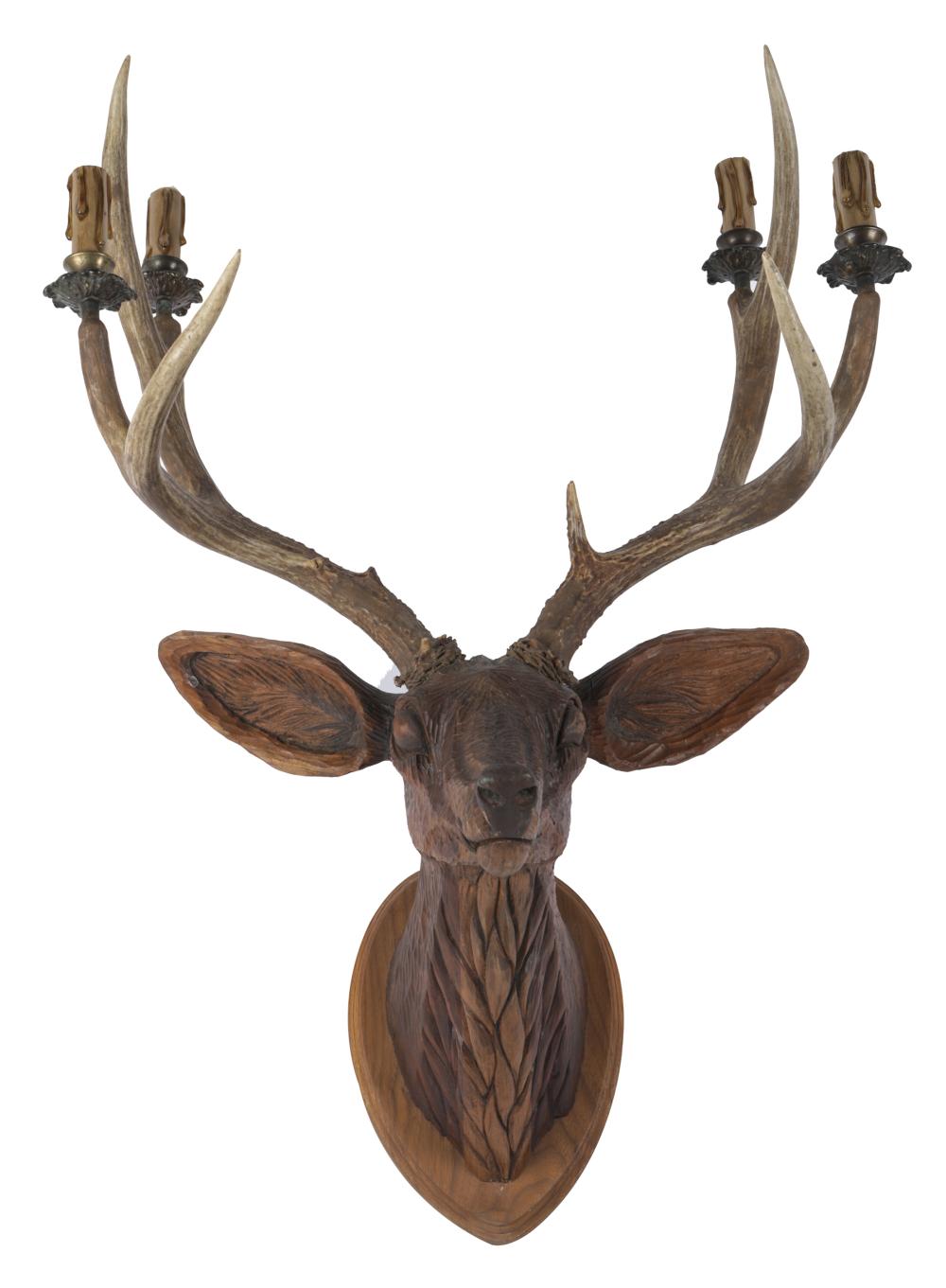 Appraisal: BLACK FOREST-STYLE CARVED WOOD WALL SCONCEcarved as a stag his