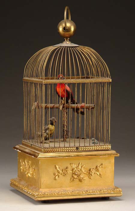 Appraisal: FRENCH MUSIC BOX BIRDCAGE WITH TWO BIRDS The square-domed top