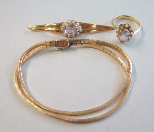 Appraisal: A gold two row box link bracelet the clasp detailed