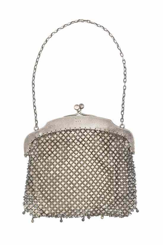 Appraisal: A German Silver Mesh Purse having a chain handle patterned