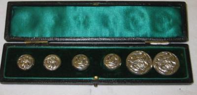 Appraisal: A MATCHED SET OF SIX ART NOUVEAU SILVER BUTTONS moulded