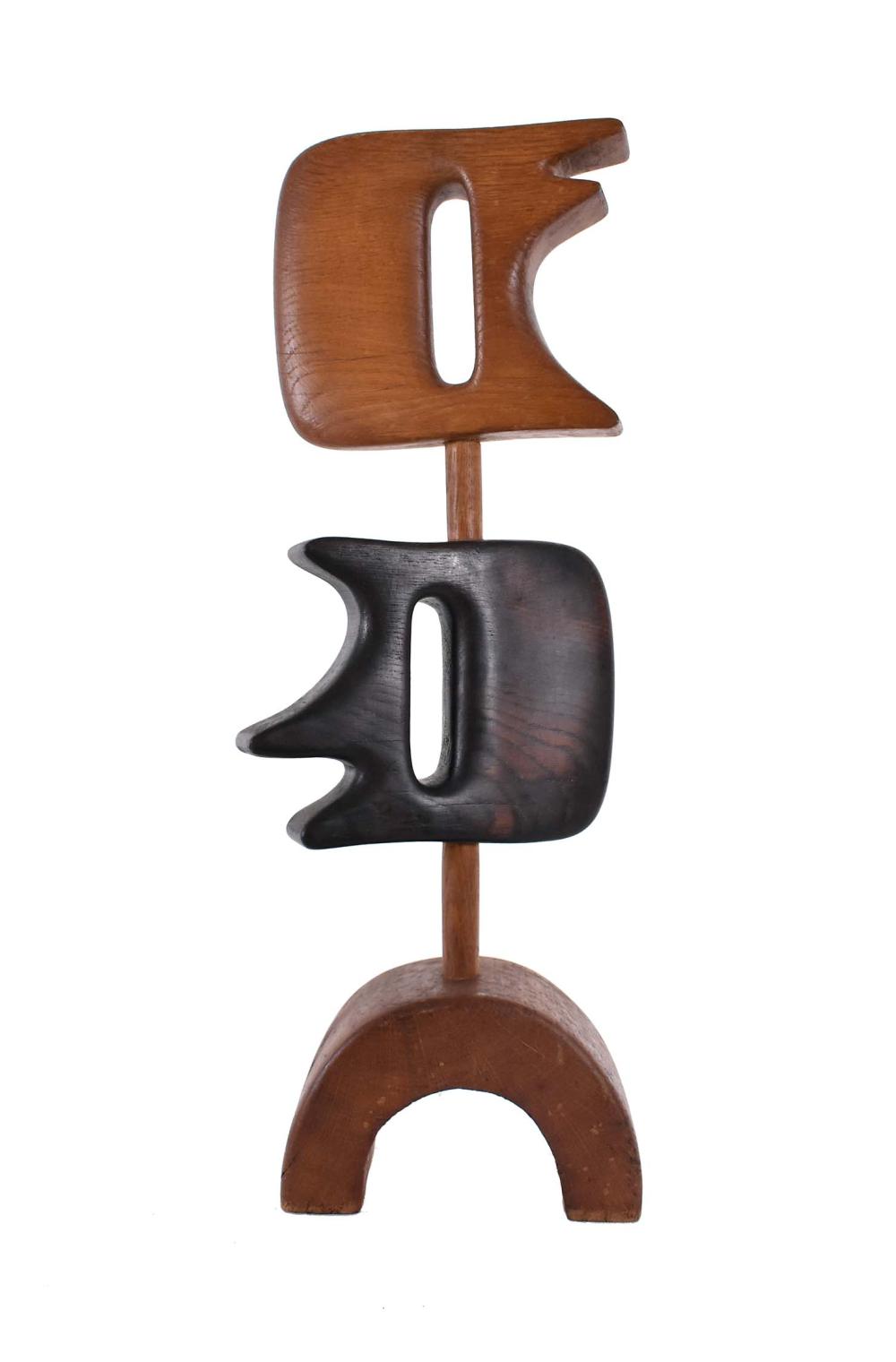 Appraisal: MODERNIST CARVED VARIOUS WOOD ABSTRACT SCULPTUREIn the form of two