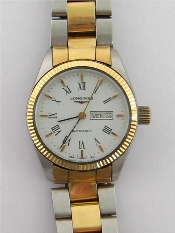 Appraisal: Longines a lady s stainless steel and carat gold automatic