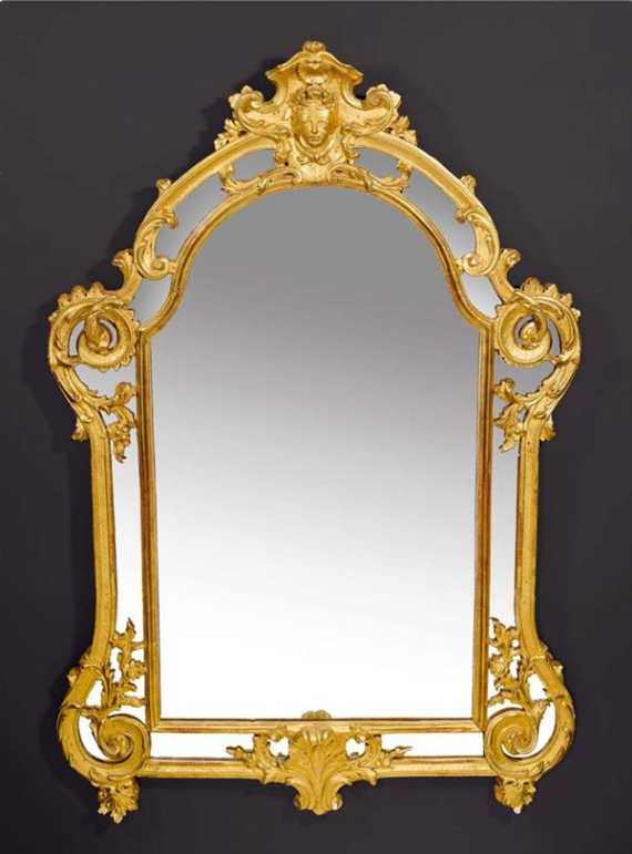 Appraisal: PIERCED AND CARVED GILTWOOD MIRROR AU BUSTE DE FLORE R