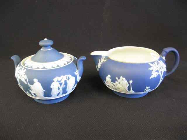 Appraisal: Wedgwood Dark Blue Jasperwarecreamer sugar classical maidens in garden scenes