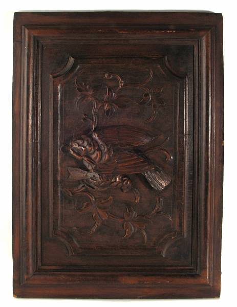 Appraisal: A composite faux bois panel molded with two birds height