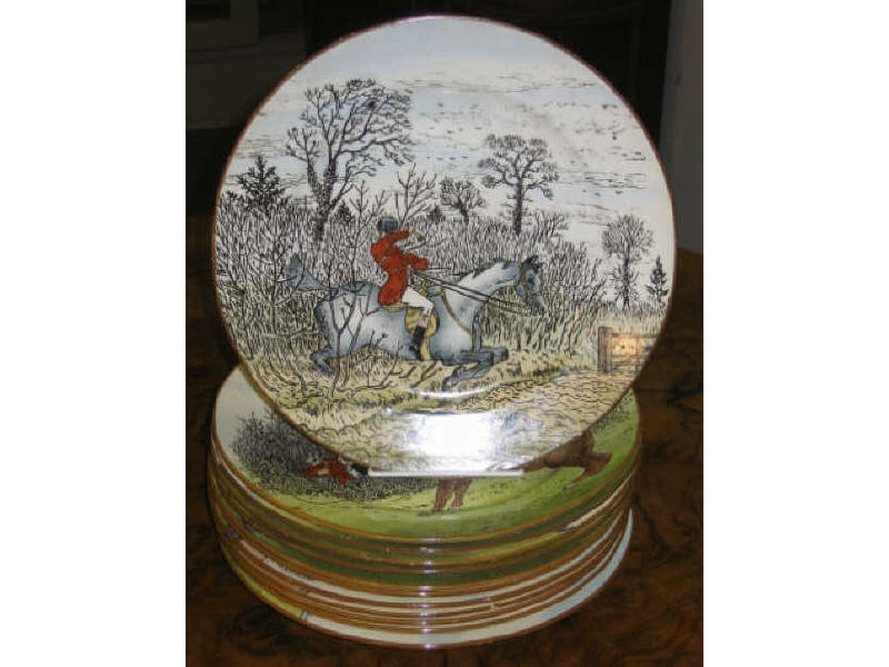 Appraisal: TWELVE CAULDON 'HUNTING' POTTERY PLATES Hand painted in style of