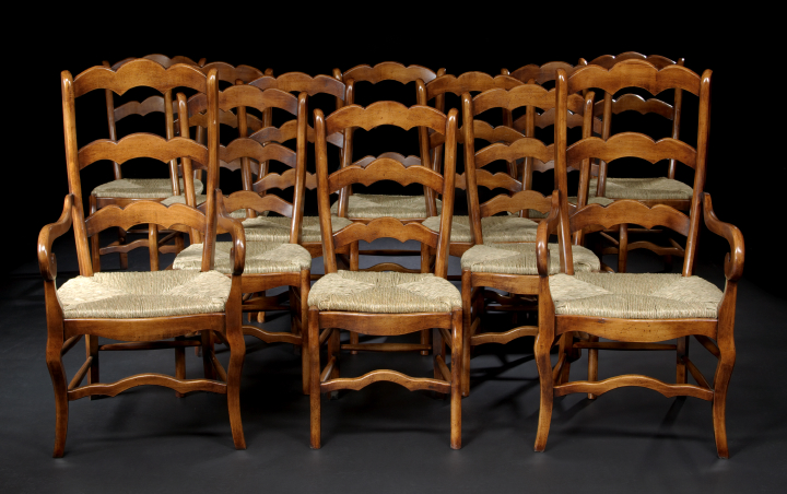 Appraisal: Suite of Twelve Provincial Fruitwood Dining Chairs consisting of two