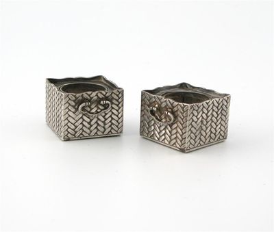 Appraisal: A pair of Oriental silver novelty salt cellars marked sterling