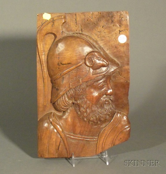 Appraisal: Continental Carved Walnut Plaque of a Classical Warrior th century