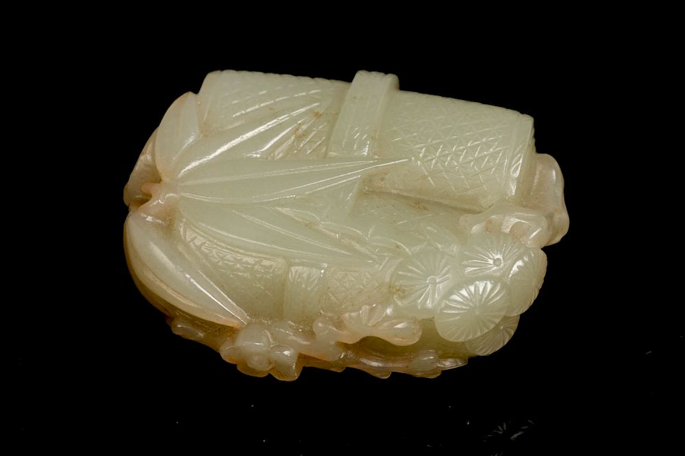 Appraisal: CELADON JADE CARVING TOGGLE of an even celadon tone depicts