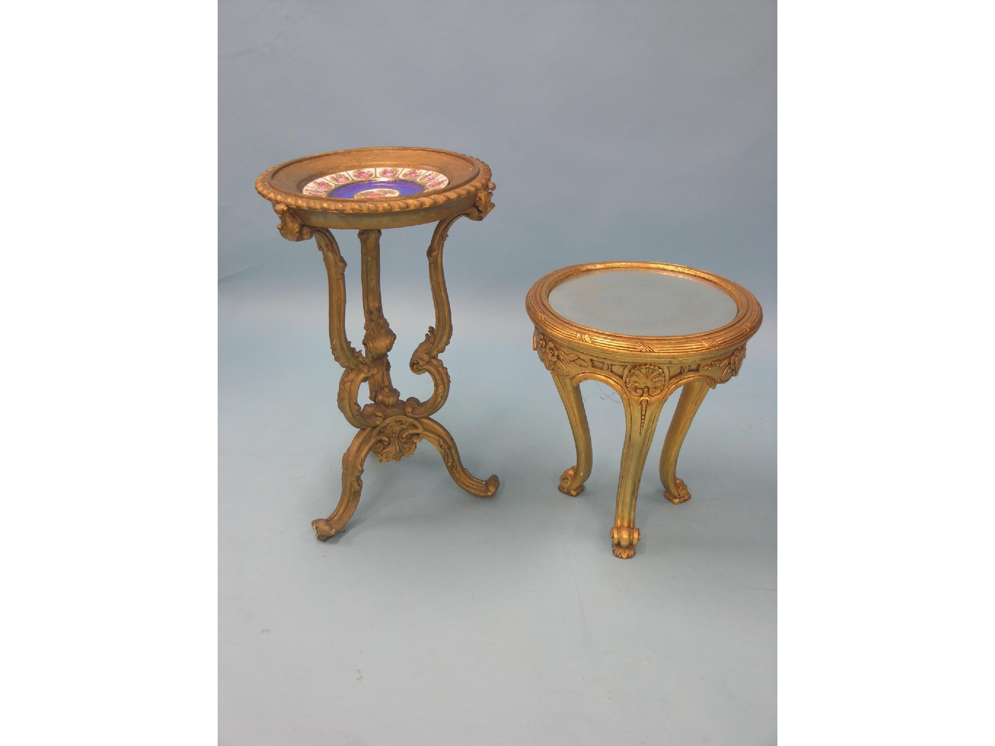 Appraisal: A French-style giltwood occasional table circular with inset mirror top