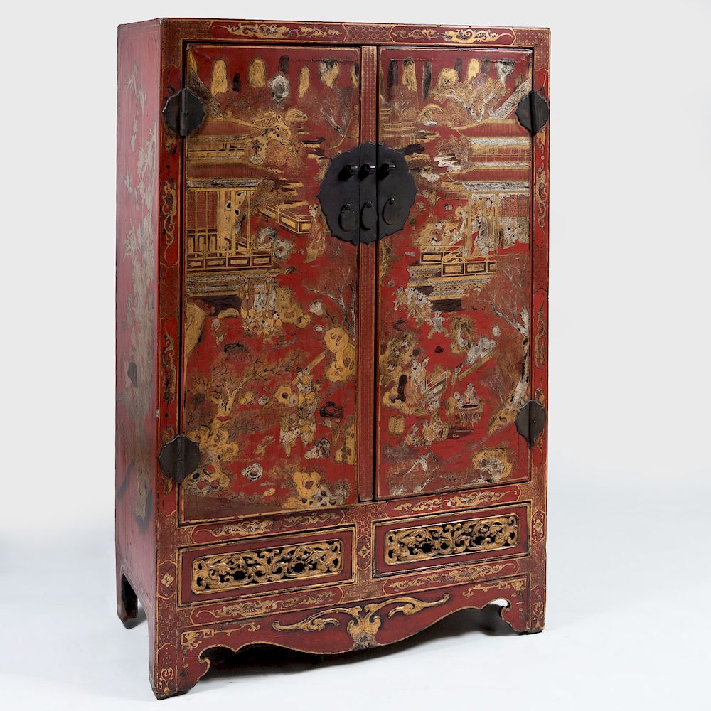 Appraisal: Chinese Metal-Mounted Red Lacquer and Parcel-Gilt Cabinet The doors opening