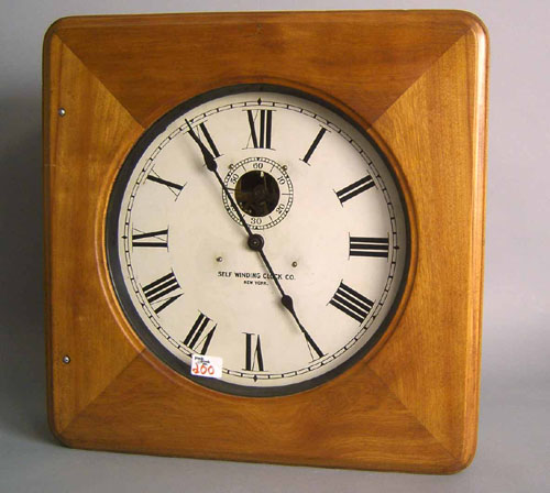 Appraisal: Self Winding Clock Co mahogany wall clock ca electric wound