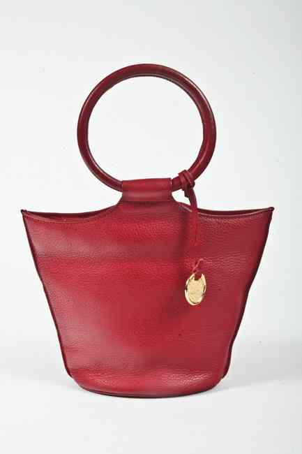 Appraisal: SONIA RYKIEL RED LEATHER HANDBAG Bucket form with ring handles