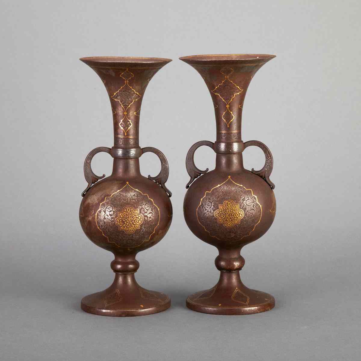 Appraisal: Pair of Qajar Gold and Silver Damascened Steel Vases Iran