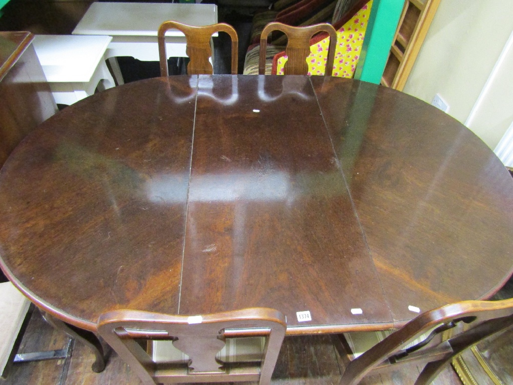 Appraisal: A late Edwardian mahogany dining room suite comprising a D