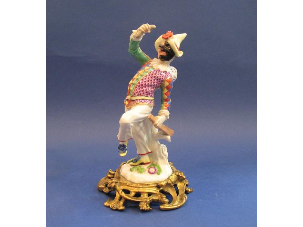 Appraisal: A MEISSEN STYLE PORCELAIN FIGURE of a dancing harlequin mounted