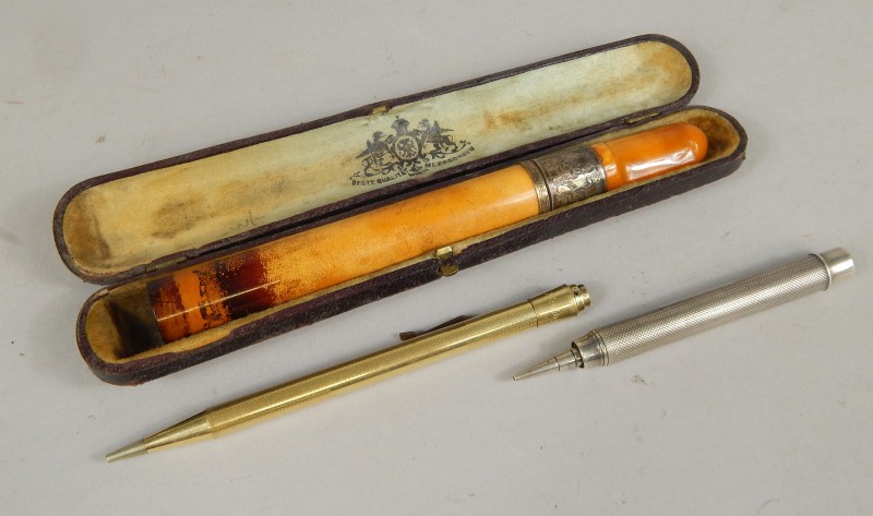 Appraisal: An early thC propelling pencil in engine turned rolled gold