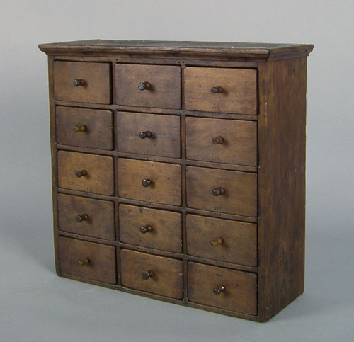 Appraisal: New England cherry apothecary cabinet early th c with drawers