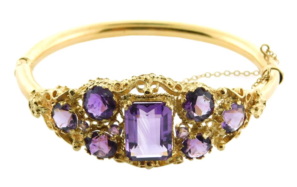 Appraisal: JEWELRY K yellow and amethyst bangle bracelet six round and