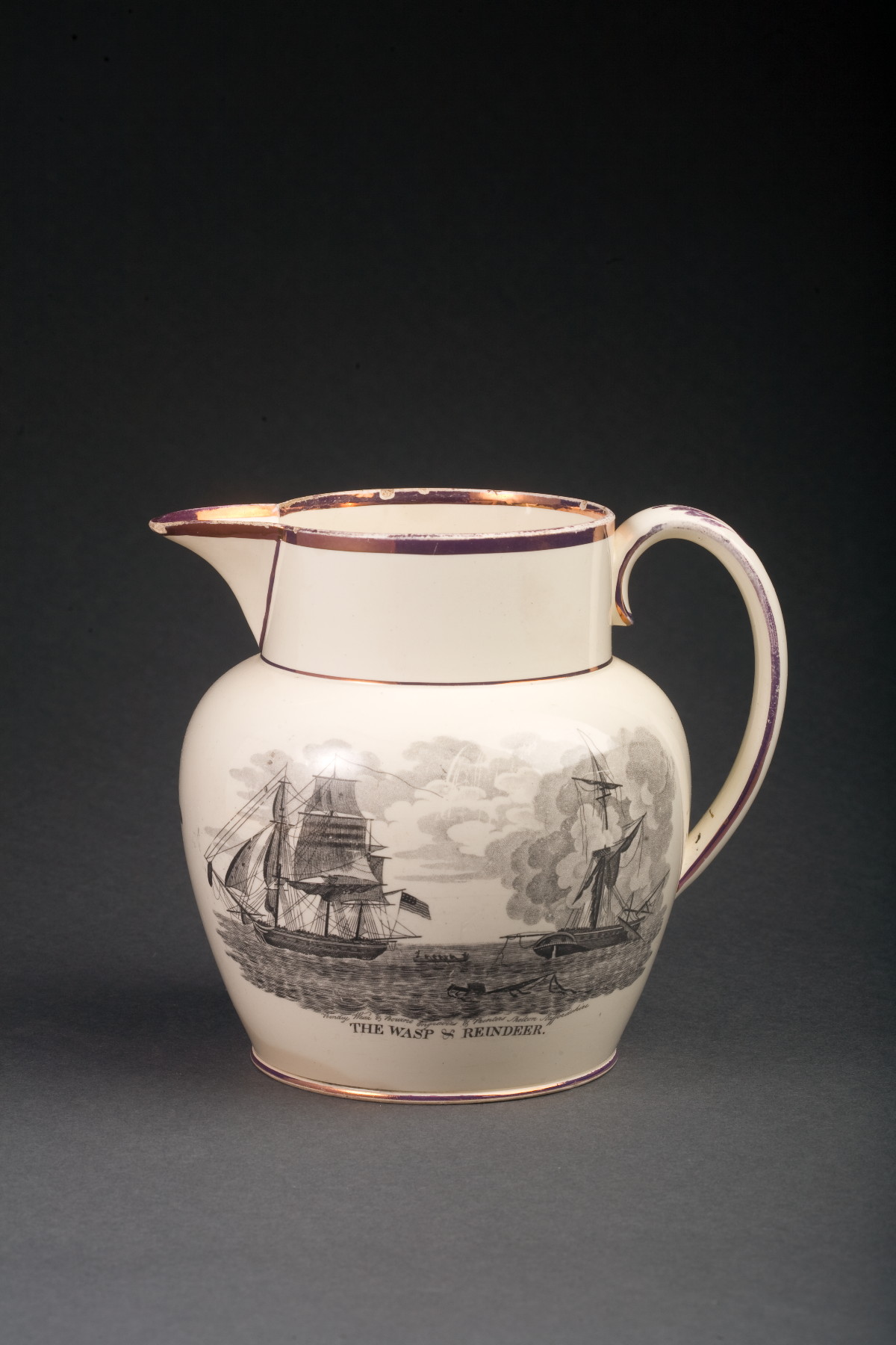 Appraisal: RARE ENGLISH BLACK TRANSFER-PRINTED AND PINK LUSTRE-DECORATED JUG STAFFORDSHIRE CIRCA