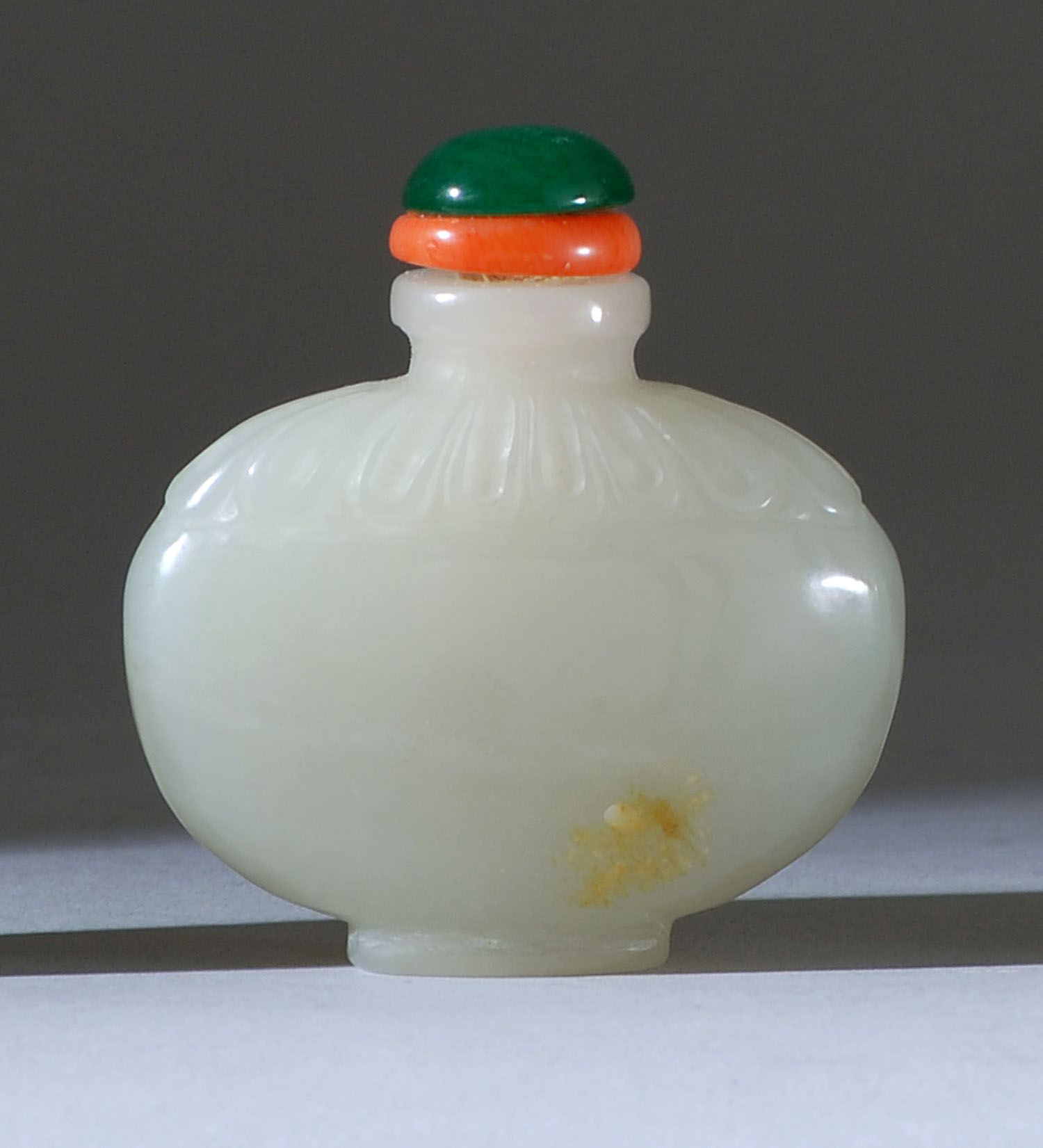 Appraisal: WHITE JADE SNUFF BOTTLE Early th CenturyIn pilgrim flask form