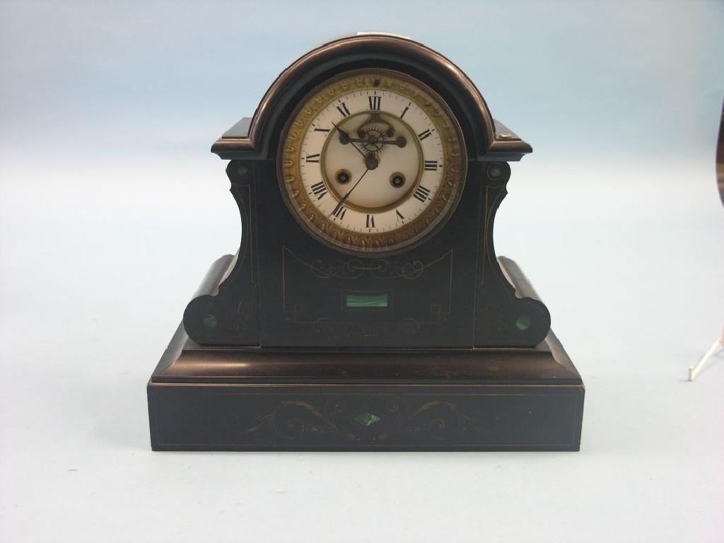 Appraisal: A Victorian black slate mantel clock enamelled dial with exposed