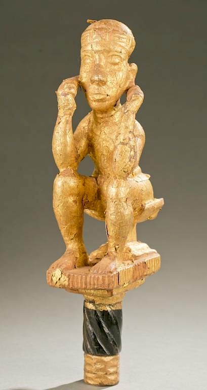 Appraisal: Akan gold leaf seated figure and sword handle t A